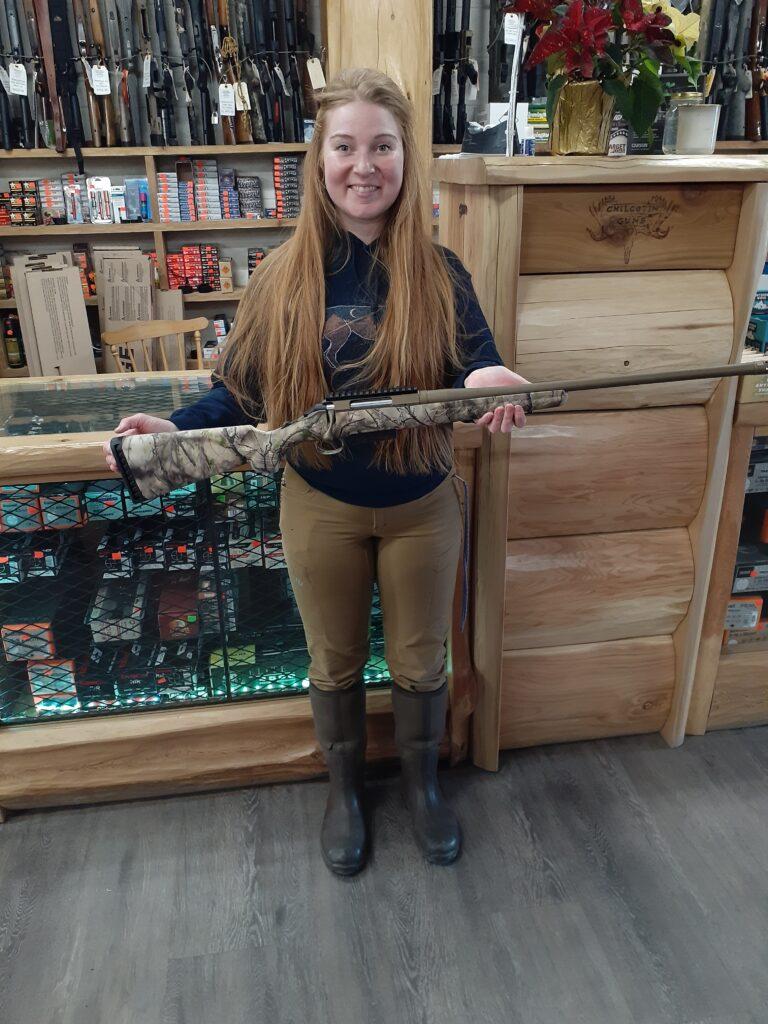 Hana displaying a Ruger American 450 Bushmaster